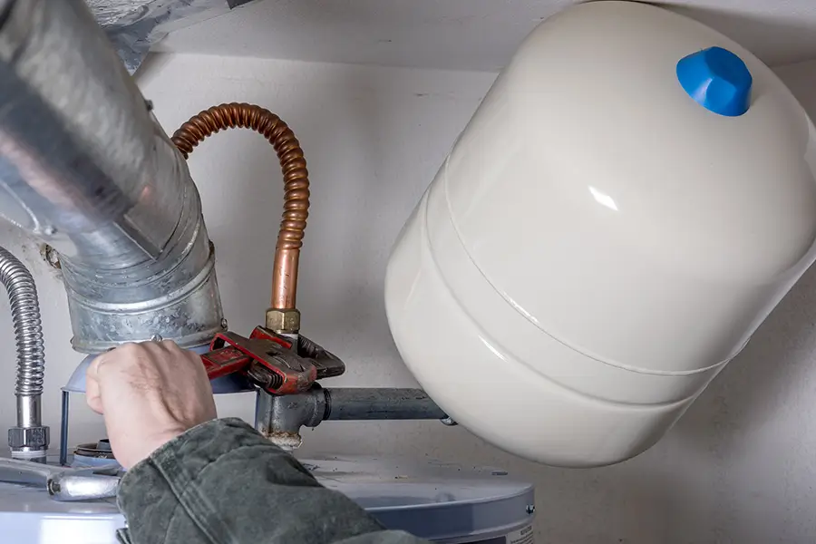 Water heater pipe adjustment