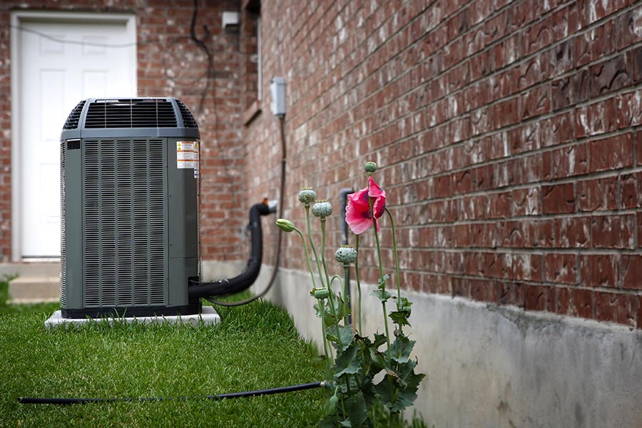 Outdoor AC beside house
